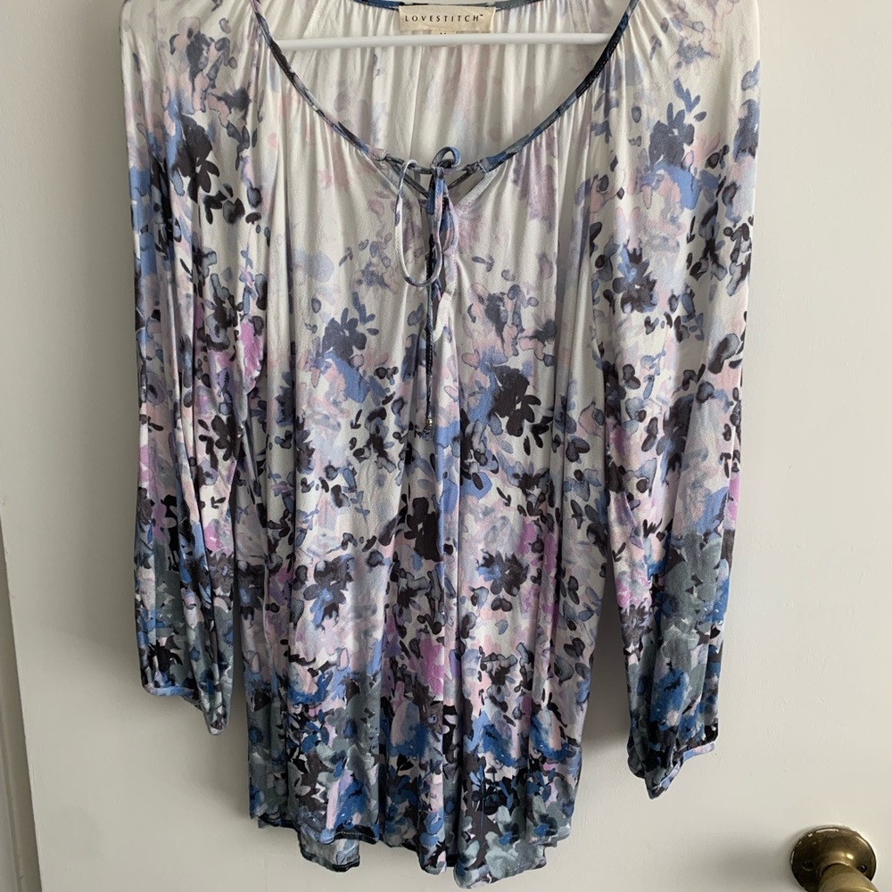 Love stitch medium size blue,white and purple blouse.